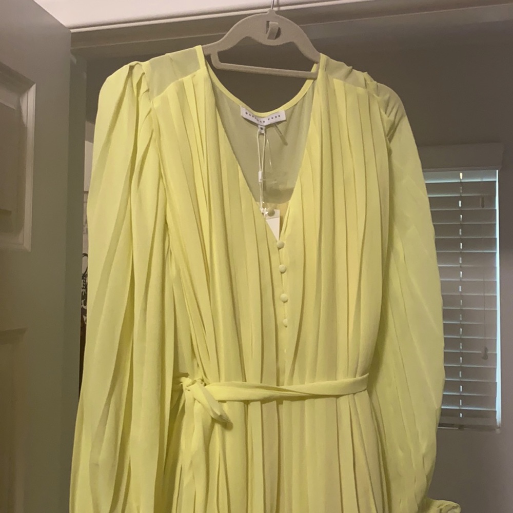Bright yellow romper.